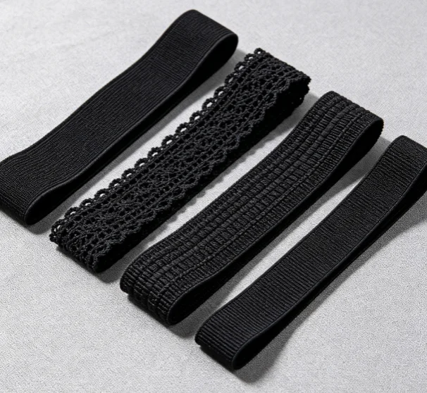 Assorted black elastic bands textile supply flat lay